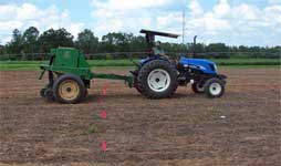 photo showing the drill in action during seeding July 2007