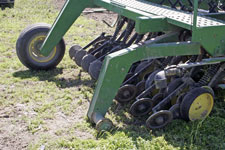 photo of drill with flat tire and wheel removed