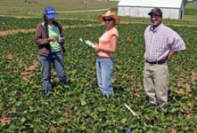 photo of team members in test plot