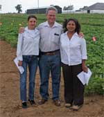 photo of Dr. Jim Board flanked by Research Specialist Elena Prior and Dr. Saratha Kumudini