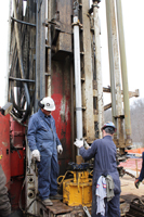 A 90-foot-long core of the Nolichucky member of the Conasauga Group is pulled out of the well. 