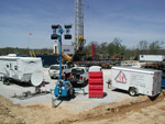Trailers, communications equipment and other facilities on the well site after drilling began.
