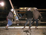 As coring of the New Albany shale begins, workers lay down the core barrel on May 1.