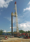 Another view of the Nabors workover rig at the site during injection operations.