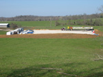 The drilling rig arrives at the site on April 17, 2009.