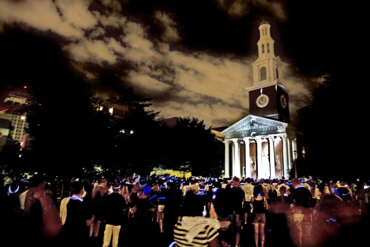 Photo of nighttime vigil in front of UK's Memorial Hall
