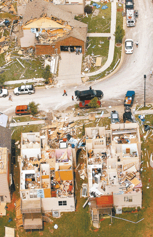 An aerial photo shows the destruction caused by Thursday night's storm in the Masterson Station subdivision. Authorities confirmed that what hit was a tornado with a partial F3 rating - meaning winds of 158-206 mph accompanied by heavy damage. Charles Bertram/Staff