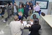 The large crowd at the annual seminar kept KGS staff and students busy at the check-in tables.