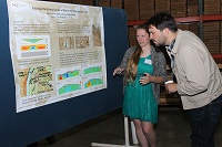 Northern Kentucky University geology student Sarah Lott explains her research during a poster break.