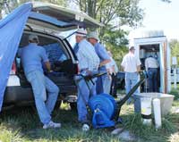 A downhole camera was lowered over 60 feet into a well at the Kentucky Horse Park to give a view of the water flowing through the conduit. The live view was visible on a monitor in the back of a KGS truck.