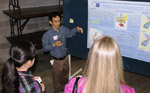 Junfeng Zhu, of the Water Resources Section, tells listeners about his poster on groundwater contamination.