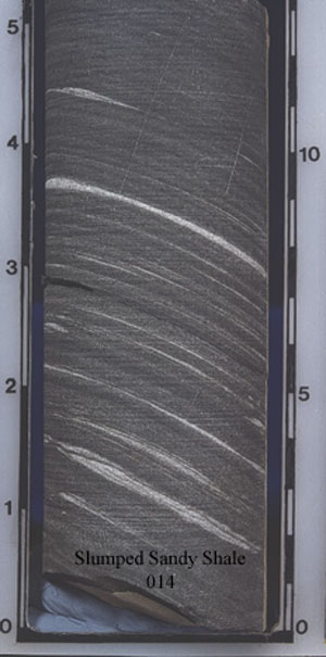 Example of a sandy shale slump in core (014). 