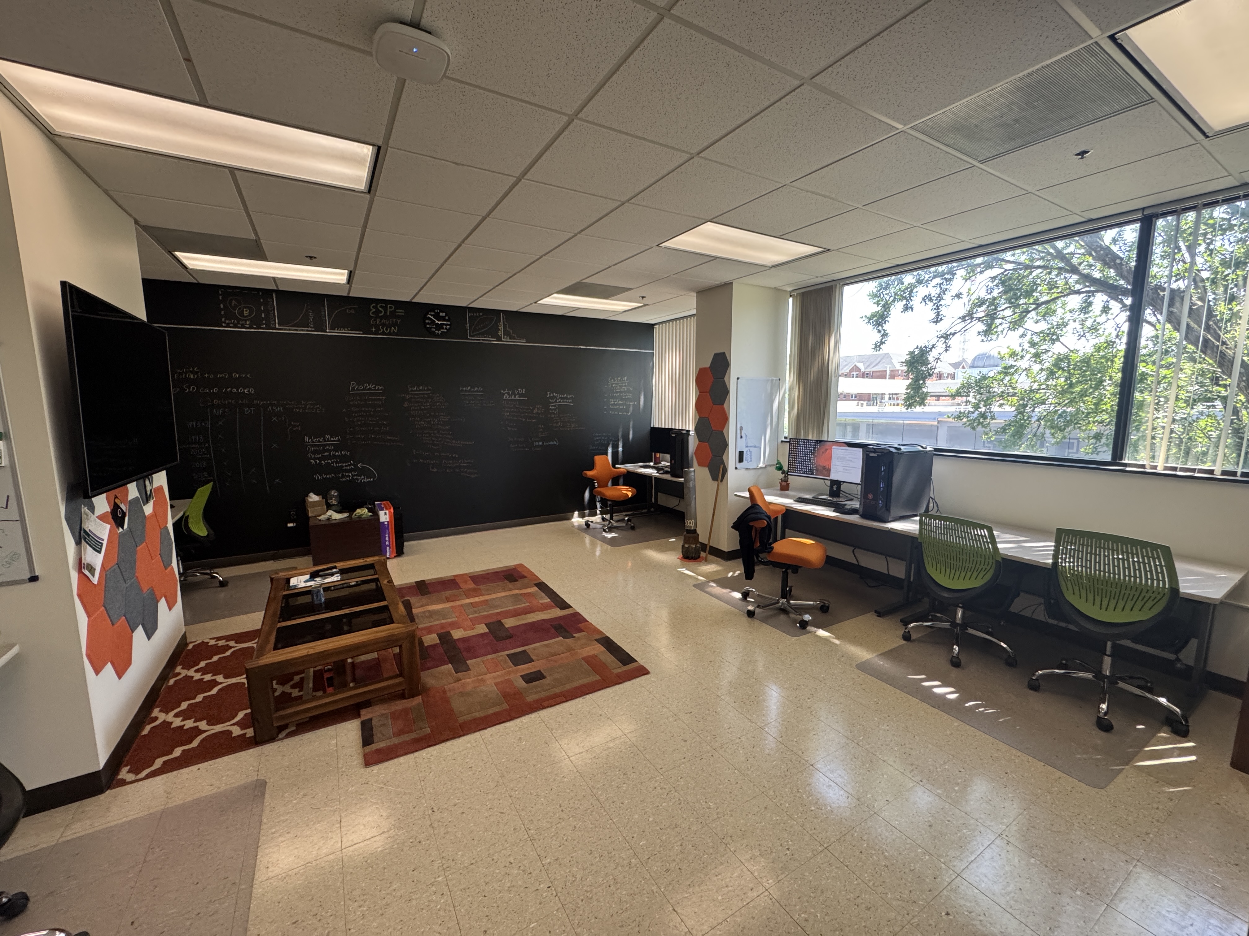 SP&M Lab workspace showing computational workstations and equipment