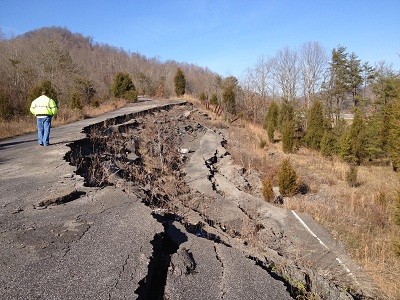 Large, rotational slump along old Ky. 10. Numerous landslides caused a rerouting of the road and the use of newer Ky. 9