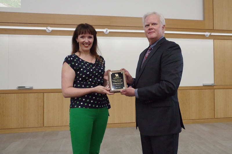 	Director Bill Haneberg presented MacCormack with the Haney Lecture plaque.