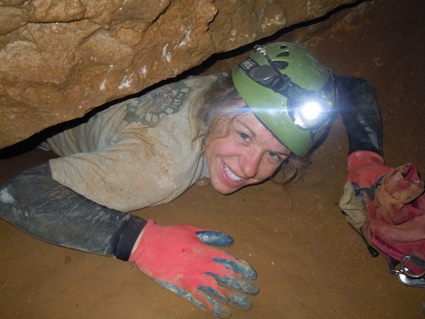 Sarah Arpin emerges from “The Keyhole,” an obstacle on the route to Floyd’s Lost Passage in Floyd Collins Crystal Cave, at Mammoth Cave National Park.