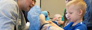 Child Life Specialist working with a young child.