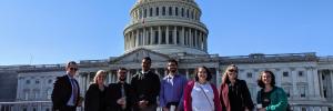 Small group of students in front of a government building in Washington, D.C.