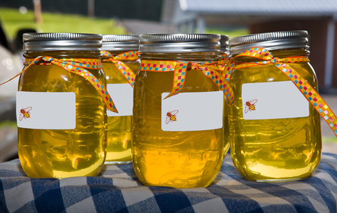 Jars of honey at a farmers market