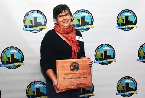 Shari Dutton receives a Lexington-Fayette Urban County Environmental Commission award.
