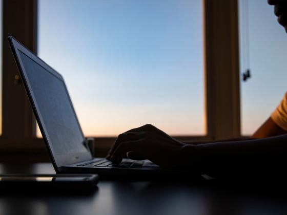 A person on a laptop
