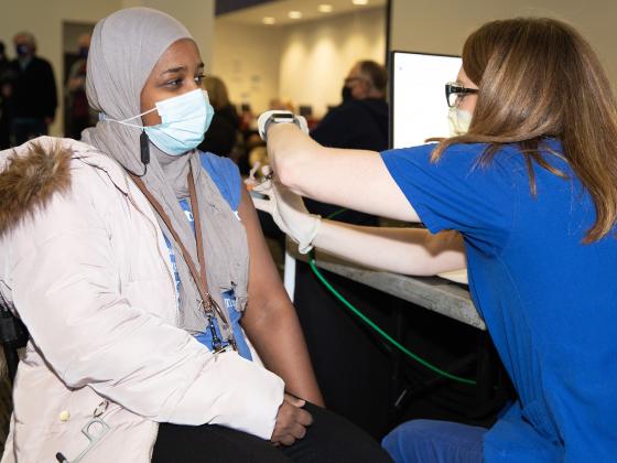 A person getting a vaccine.