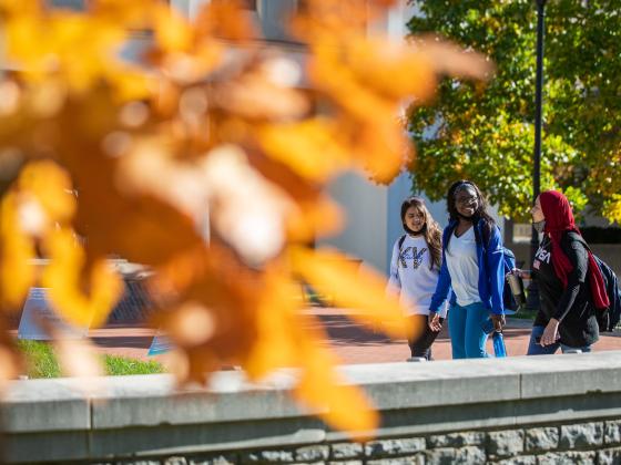 Photo of students walking through campus